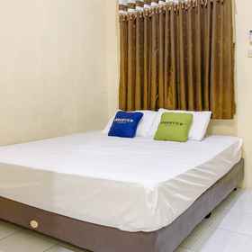 Bedroom 1 Urbanview Hotel Hikmah Syariah Majalengka, Majalengka Hotels