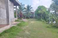 Others OYO 92587 Homestay Romauli Kampung Radja