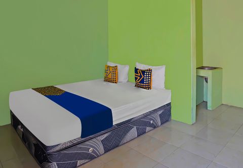 Bedroom Hotel O Guesthouse Prima SyariahNearGPdI Anugerah
