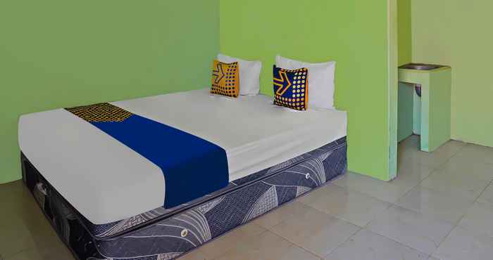 Bedroom SPOT ON 92669 Guesthouse Prima Syariah
