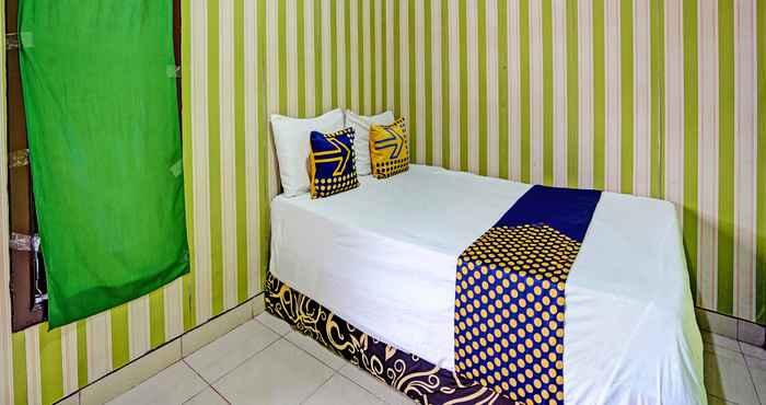 Bedroom SPOT ON 92673 Gang Songo Syariah Homestay