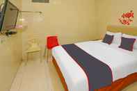 Bedroom Capital O Hotel Sion Holiday Tangerang