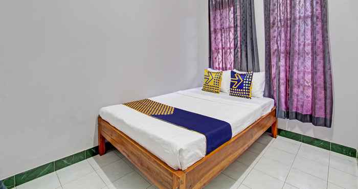 Kamar Tidur SPOT ON 92575 Zazi Homestay 