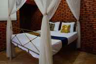 Kamar Tidur SPOT ON 92698 Holy Homestay