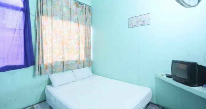 Kamar Tidur SPOT ON 92715 Joyoakis 2 Homestay Syariah