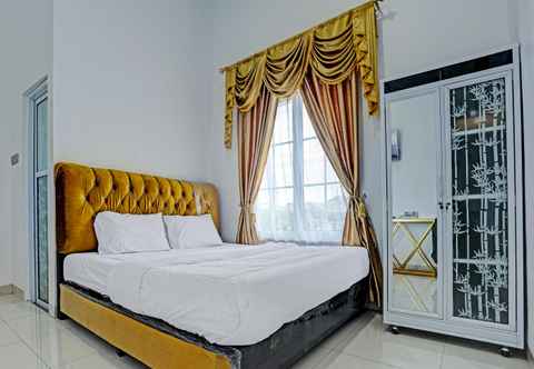 Bedroom OYO 92708 Hotel Mufasa Syariah