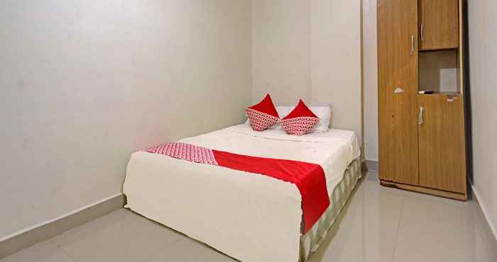 Bedroom OYO 92741 Octav Homestay