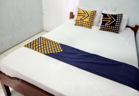 Kamar Tidur SPOT ON 92743 Kost Elisabeth Syariah