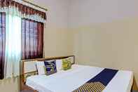 Bedroom SPOT ON 92760 Global Media Homestay Syariah