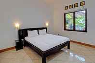 Bedroom OYO 92752 882 Guest House