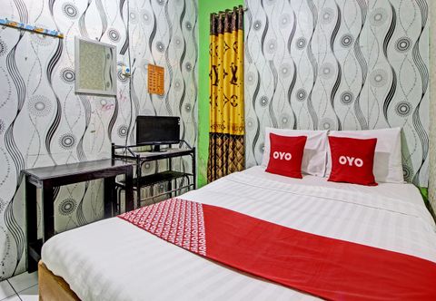 Kamar Tidur OYO 92759 Penginapan Piji Kembar