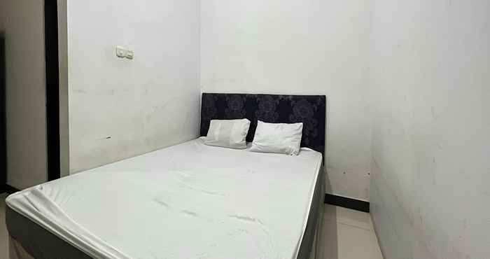 Bedroom SPOT ON 92777 Leheran Homestay