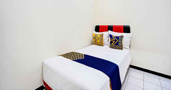 Bedroom SPOT ON 92785 Wisma Trubus  Syariah