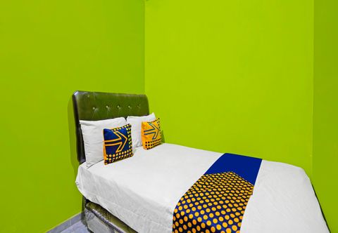 Bedroom Hotel O Homestay Barokah