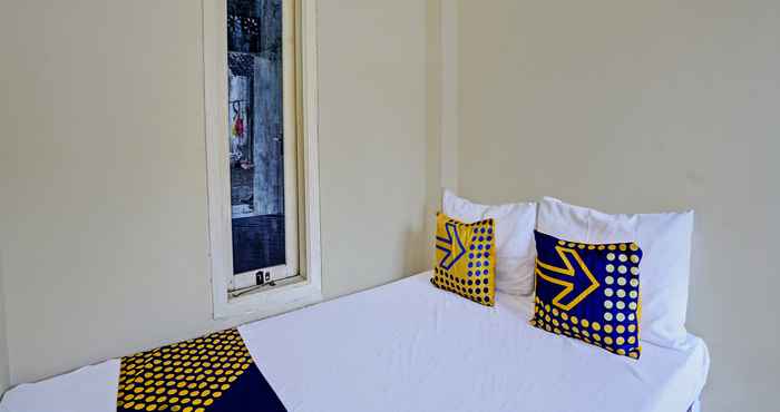 Kamar Tidur SPOT ON 92799 Tanjung Indah Homestay Syariah 