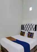 BEDROOM SPOT ON 92797 Awi Stay Syariah