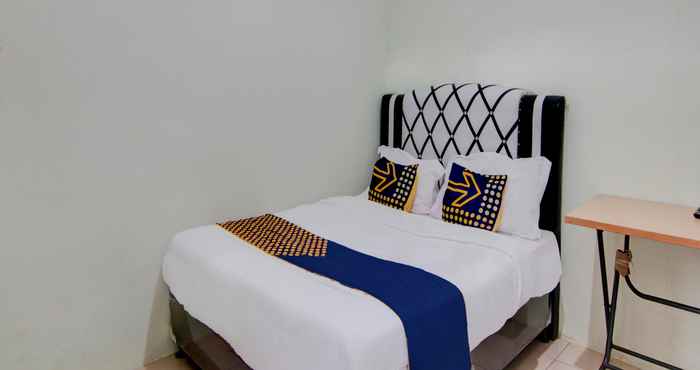 Bedroom SPOT ON 92797 Awi Stay Syariah