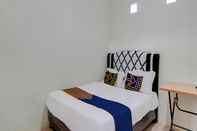 Bedroom SPOT ON 92797 Awi Stay Syariah