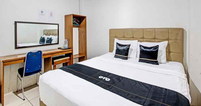 Phòng ngủ Capital O 92819 Pm Indah Hotel