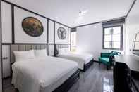 Phòng ngủ Phong Lan Unique Hotel