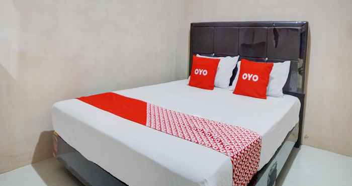 Bedroom OYO 92826 Penginapan Syariah Faster Inn