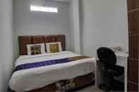 Bedroom SPOT ON 92822 Finest House Near Amplas Bus Terminal