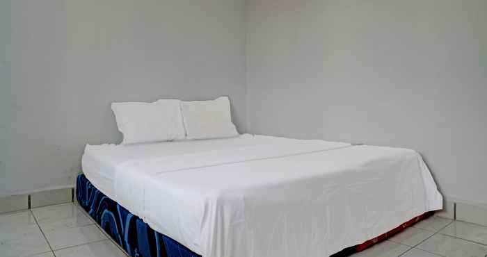 Kamar Tidur SPOT ON 92856 Home Stay Syariah Aom Kusman