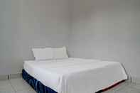 Kamar Tidur SPOT ON 92856 Home Stay Syariah Aom Kusman