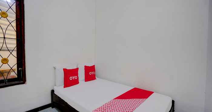 Bedroom OYO 92848 Tri D Homestay Syariah