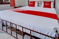 Kamar Tidur New OYO 92869 Hotel Nusantara