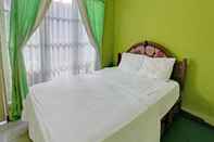 Bedroom OYO 92849 Hotel Dienda Hayu