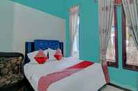 Bedroom OYO 92872 Swakarya Guest House