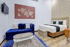 卧室 Capital O 92895 House N Caffe 55