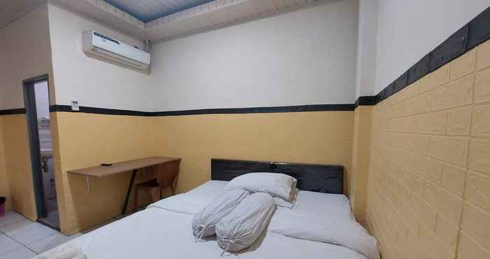 Kamar Tidur OYO 92891 Mahendra Homestay