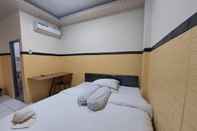 Kamar Tidur OYO 92891 Mahendra Homestay