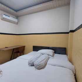 Bedroom 1 Hotel O Mahendra HomestayNearTaman Wisata Bukit Rurukan, North Sulawesi Hotels