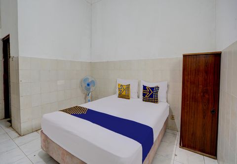 Bedroom Hotel O Homestay Kedamean