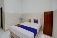 Bedroom Hotel O Homestay Kedamean