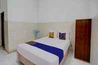 Bedroom SPOT ON 92876 Homestay Kedamean