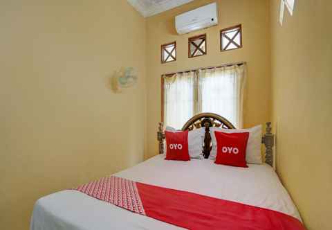 Bedroom OYO 92903 Barokah Hotel Syariah