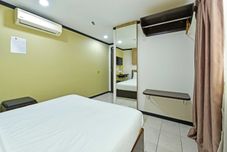 침실 OYO 91009 One Enigma Hotel