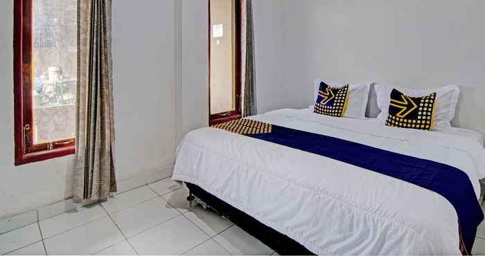 Kamar Tidur SPOT ON 92914 Meranti Homestay