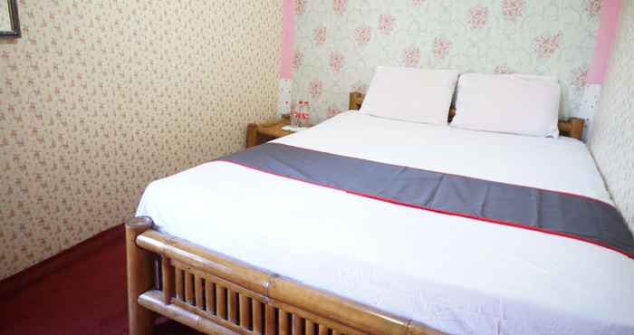 Bedroom Capital O 93000 Karona Berg Homestay & Cafe