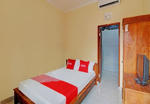 침실 OYO 92952 Nirmala Guest House