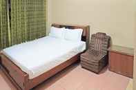 ห้องนอน Capital O 92958 Hotel Raflessia Syariah