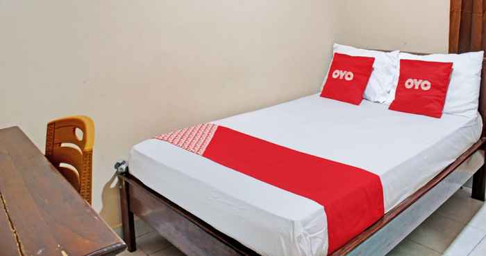 Bedroom OYO 92961 Amor Kost