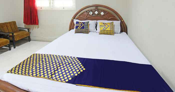 Bedroom SPOT ON 92973 Madani Syariah Guesthouse