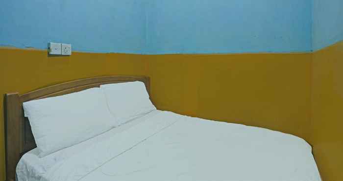 Bedroom SPOT ON 92985 Mitra Homestay