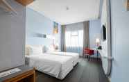 Bedroom 6 Luminor Hotel Metro Indah - Bandung by WH