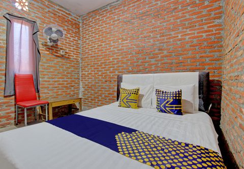 卧室 SPOT ON 93010 Omah Bareng Syariah Sambisari